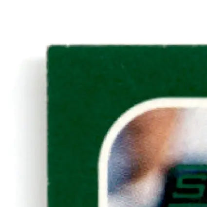 Corner of a green Score Football Jerry Rice card with white border for San Francisco 49ers