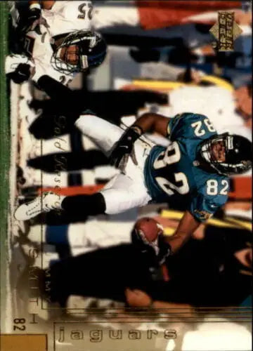 Football player in action on 2000 Upper Deck Gold Reserve Jimmy Smith Near Mint card