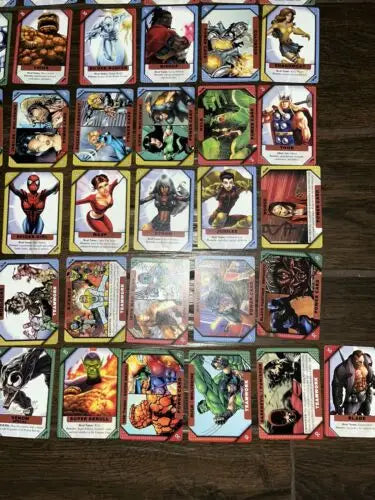 Marvel Recharge trading cards featuring foil cards of Cyclops and Angel in a lot