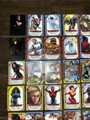 Marvel Recharge trading cards featuring Cyclops and Angel, including two foil cards