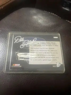 Dale Earnhardt trading card from 2001 Press Pass Optima Performance #DE24 HOF