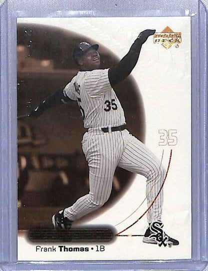 Baseball card of Frank Thomas swinging bat in Chicago White Sox pinstripes, Upper Deck Ovation