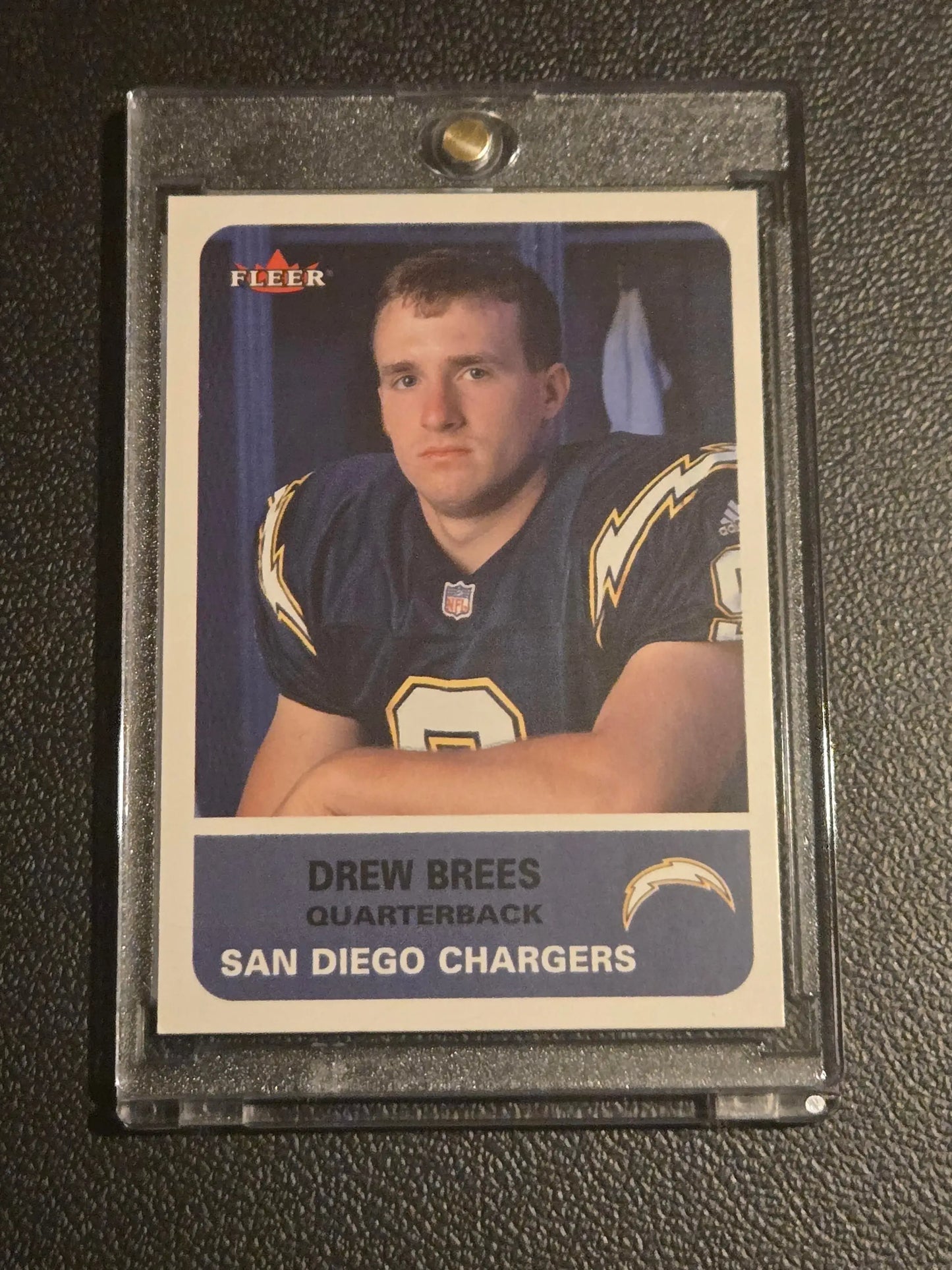 Drew Brees rookie football card in protective case 2002 Fleer #8 collectible item
