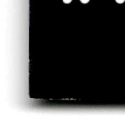 Solid black playoff football prestige Jerry Rice memorabilia with worn bottom edge