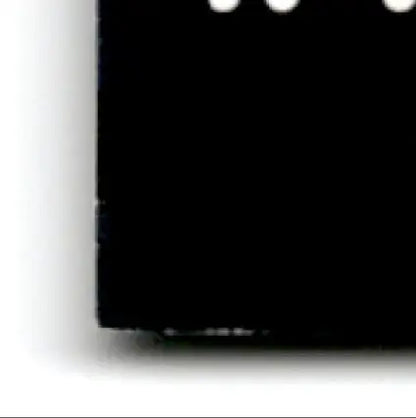 Solid black playoff football prestige Jerry Rice memorabilia with worn bottom edge