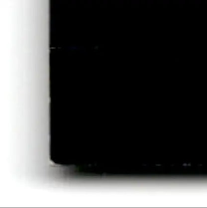 Bottom-left corner of a solid black object from 2002 Playoff Football Prestige Jerry Rice #104 Oakland Raiders