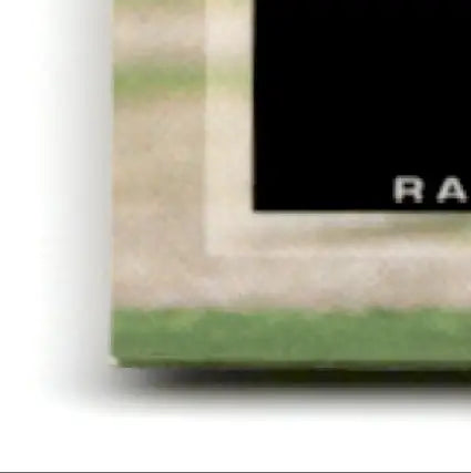 Corner of a green and beige bordered frame for Upper Deck Football Jerry Rice card