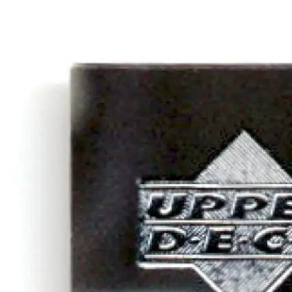 Dark-colored Upper Deck Football trading card pack with silver logo featuring Jerry Rice