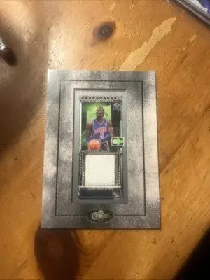 Basketball trading card with jersey swatch from 2003-04 Topps Matrix Framed Mini Relics Ben Wallace