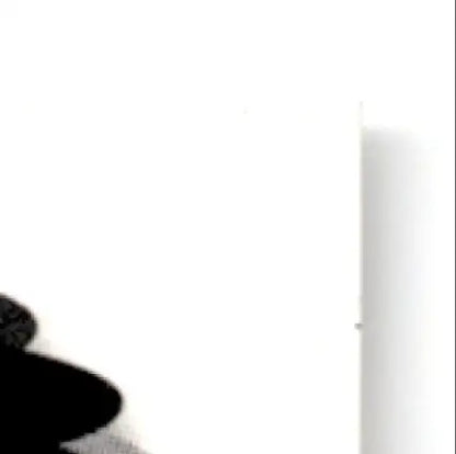 Black textured fabric with white specks from Fleer Football Ultra Jerry Rice Oakland Raiders card