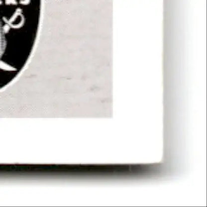 Close-up of a glossy Score Football Jerry Rice photo print with dark emblem