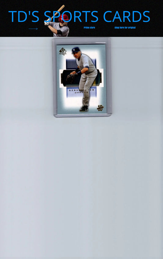 Framed Derek Jeter baseball card from 2003 SP Authentic #39 product showcasing collectible memorabilia