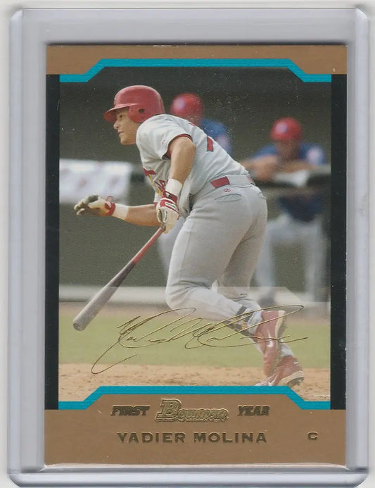 Baseball card of Yadier Molina in white uniform for 2004 Bowman Gold St. Louis Cardinals