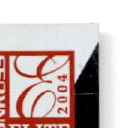 Corner of a white and black Donruss Football Elite Jerry Rice card with red logo