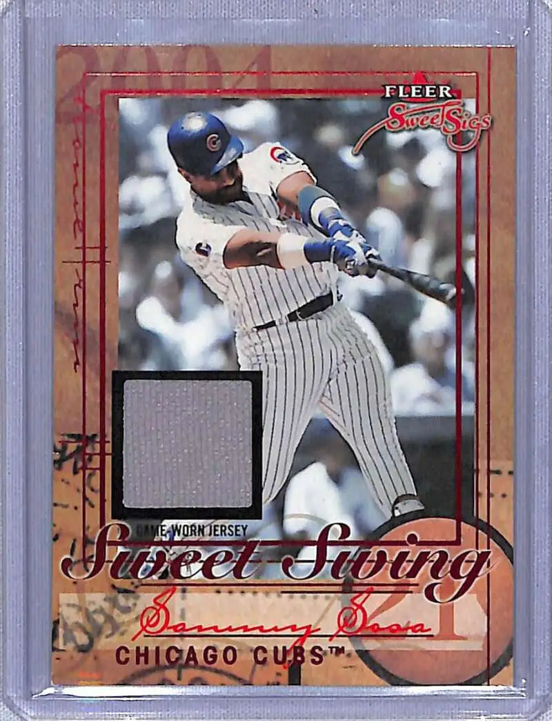Baseball card showcasing Sammy Sosa in pinstripes with a Sweet Swing jersey swatch