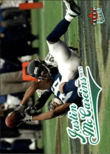 2004 Fleer Ultra #23 Justin McCareins football trading card with original gloss finish