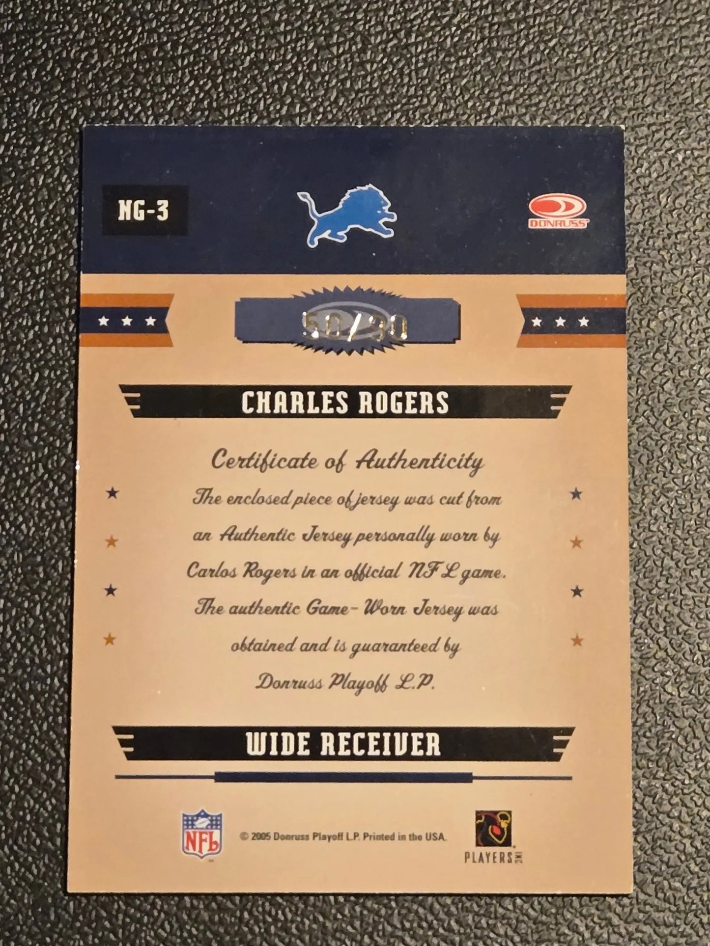 Football trading card featuring Charles Rogers and a jersey swatch from Donruss Gridiron