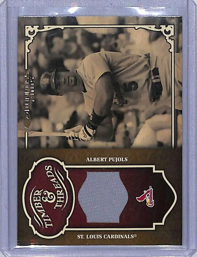 Baseball card of Albert Pujols in sepia, featuring Timber and Threads bat action photo