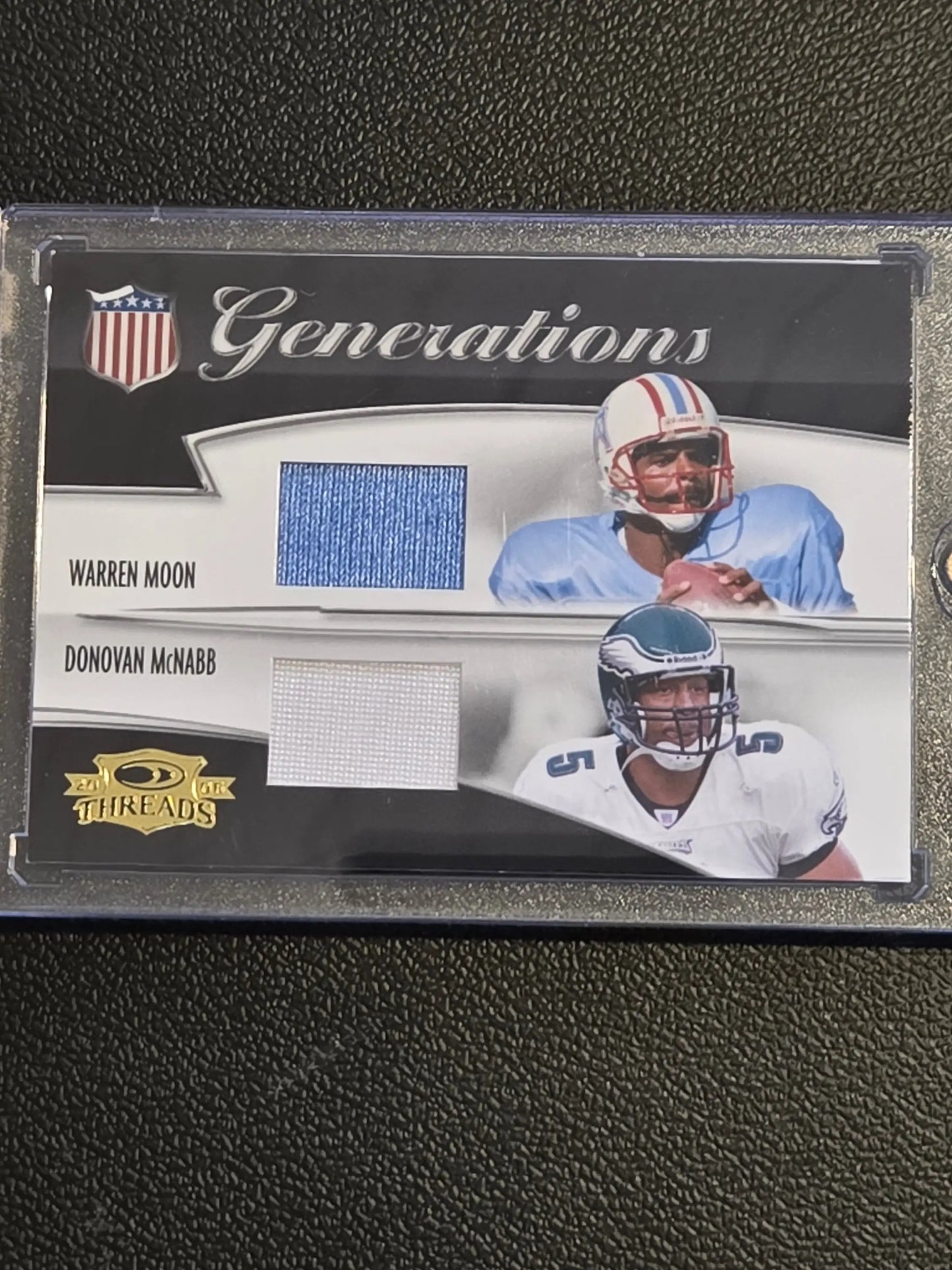 Football trading card featuring Warren Moon and Donovan McNabb from Donruss Threads