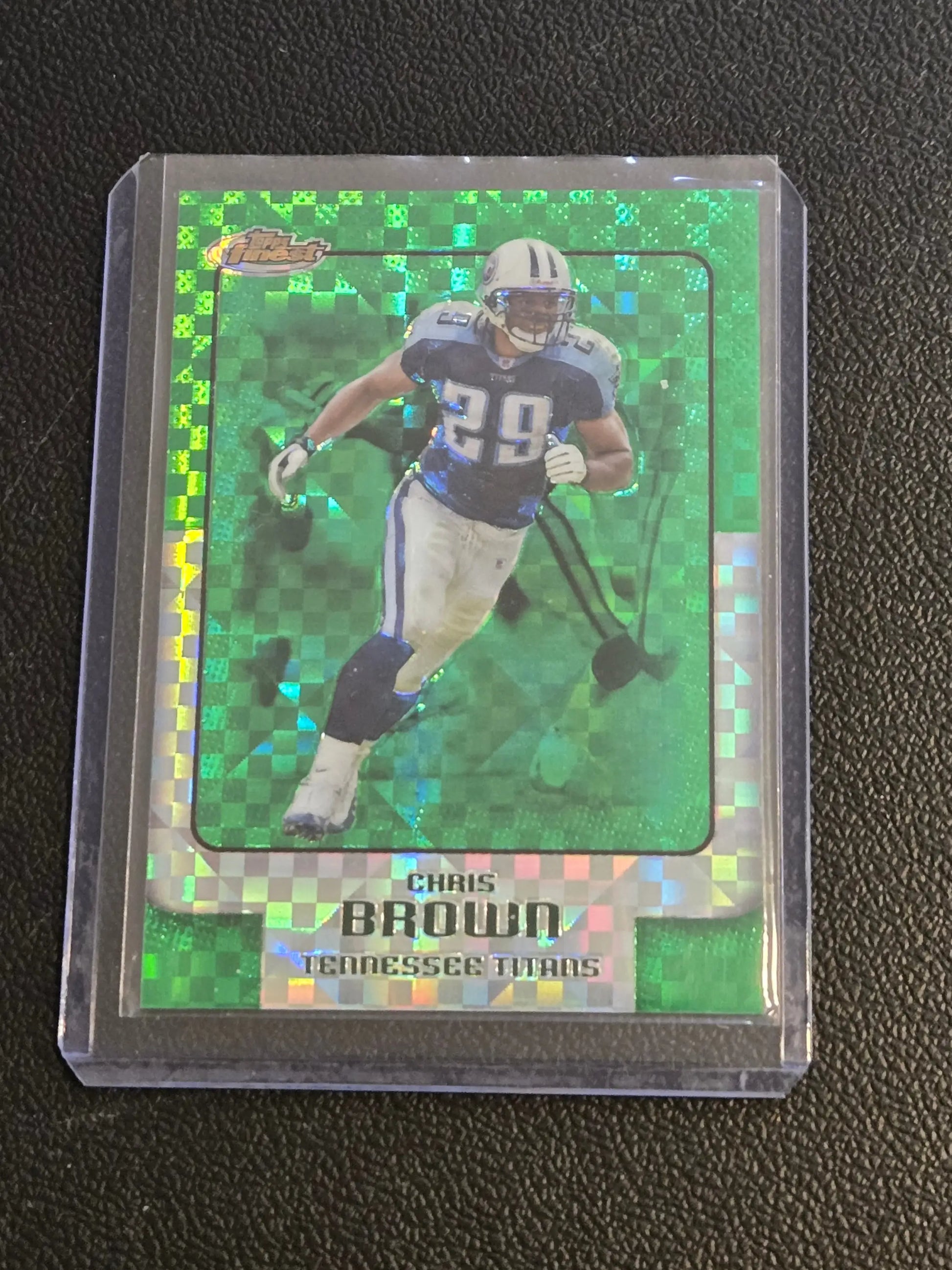Football trading card of Chris Brown Tennessee Titans with green holographic checkerboard pattern