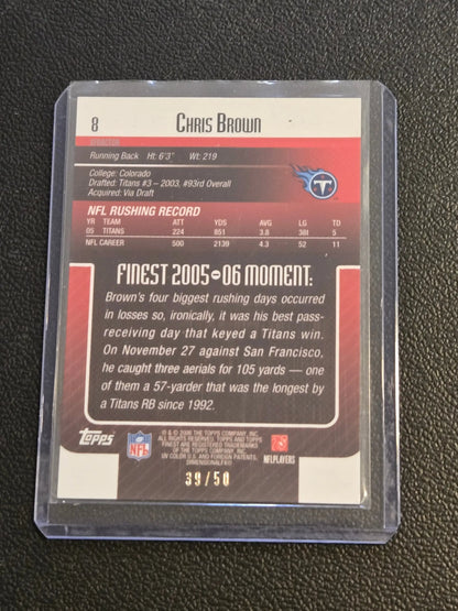 Football trading card in protective case featuring 2006 Finest Chris Brown Green Xfractors