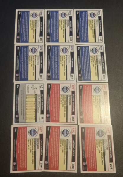 Collection of twelve Topps Pro Bowl football trading cards featuring Peyton Manning and more