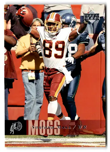 Original gloss of 2006 Upper Deck Santana Moss football card featuring a touchdown celebration