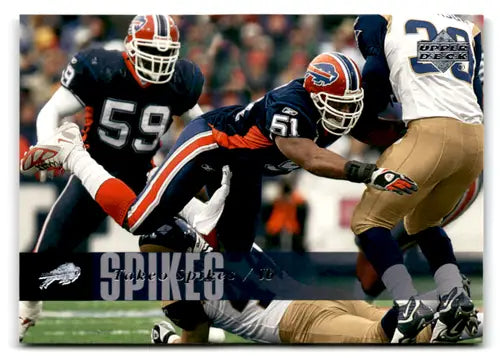 Original gloss of football players in action from 2006 Upper Deck Takeo Spikes NM-MT Bills card
