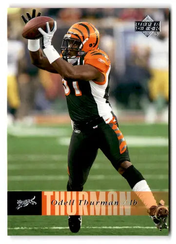 Original gloss of Odell Thurman catching a pass from Upper Deck football card