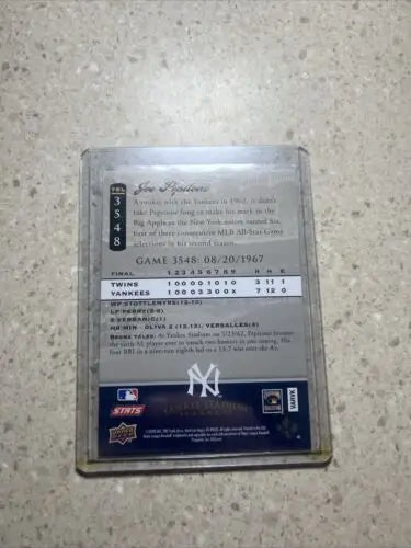 Baseball card in protective case from Upper Deck Insert Yankee Stadium Legacy collection