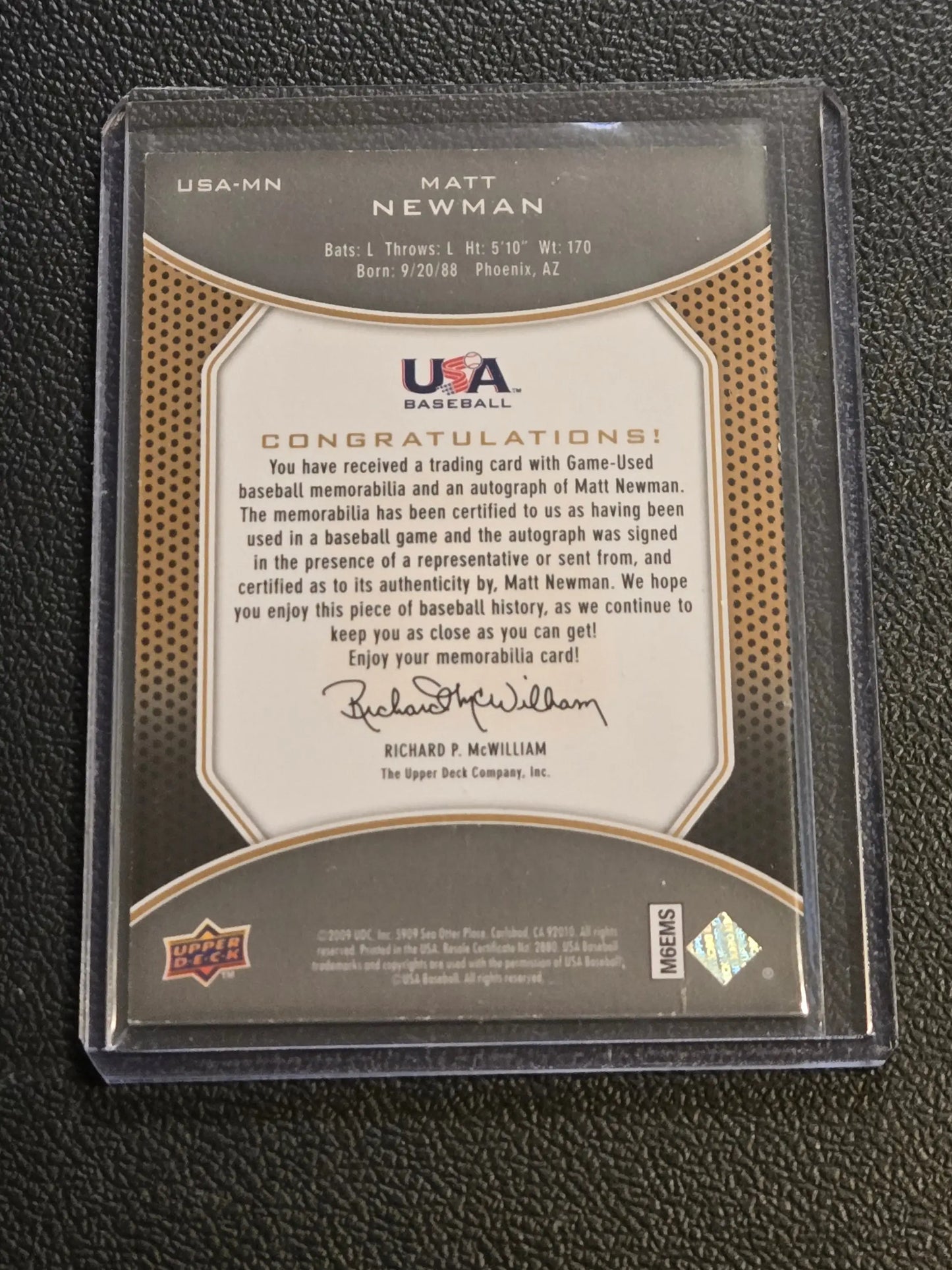 Back of a 2009 Upper Deck Signature Stars Matt Newman Jersey Auto trading card with memorabilia and autograph authentication