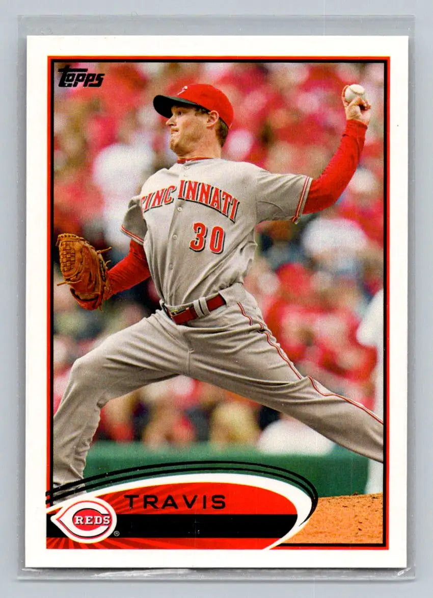 Baseball card of 142b Travis Wood from the Cincinnati Reds featuring a pitcher