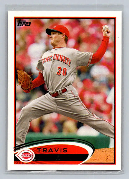 Baseball card of 142b Travis Wood from the Cincinnati Reds featuring a pitcher