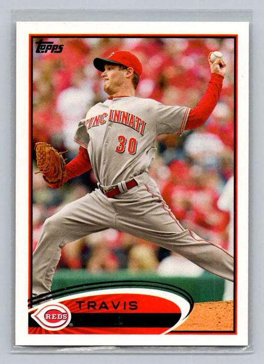 Baseball card of 142b Travis Wood from the Cincinnati Reds featuring a pitcher
