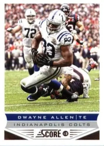 Football player Dwayne Allen in action on 2013 Panini Score original gloss card