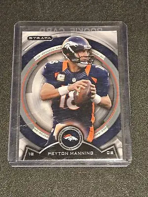 Peyton Manning rookie card from 2013 Topps Strata Peyton Manning trading collection