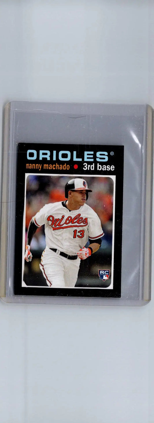 Baseball card of Manny Machado in Orioles uniform from 2013 Topps Update Topps Minis