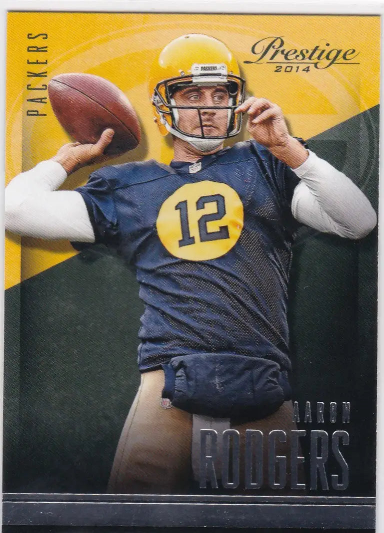 Football trading card of Aaron Rodgers in Green Bay Packers uniform ready to throw