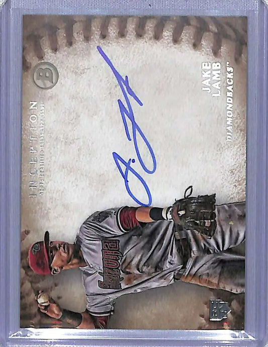Signed Jake Lamb Rookie baseball card in gray uniform making a pitching motion