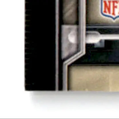 Close-up of a 2015 Topps Football Aaron Rodgers Green Bay Packers trading card with embedded swatch