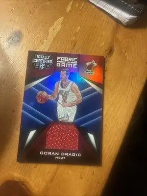 Goran Dragic basketball card from Panini Totally Certified Fabric of the Game Materials