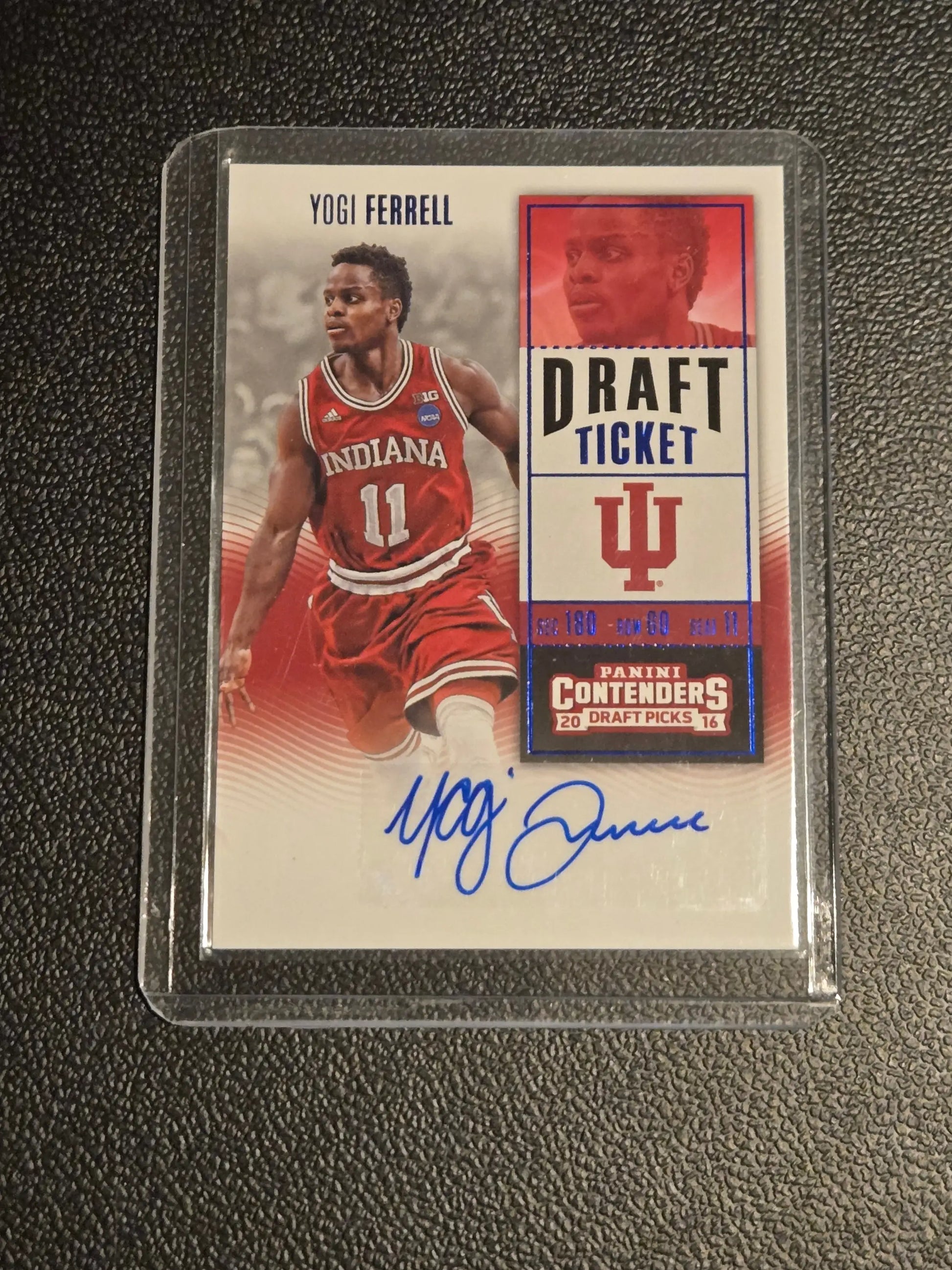 Autographed Yogi Ferrell basketball trading card in clear case from Panini Contenders Draft Picks
