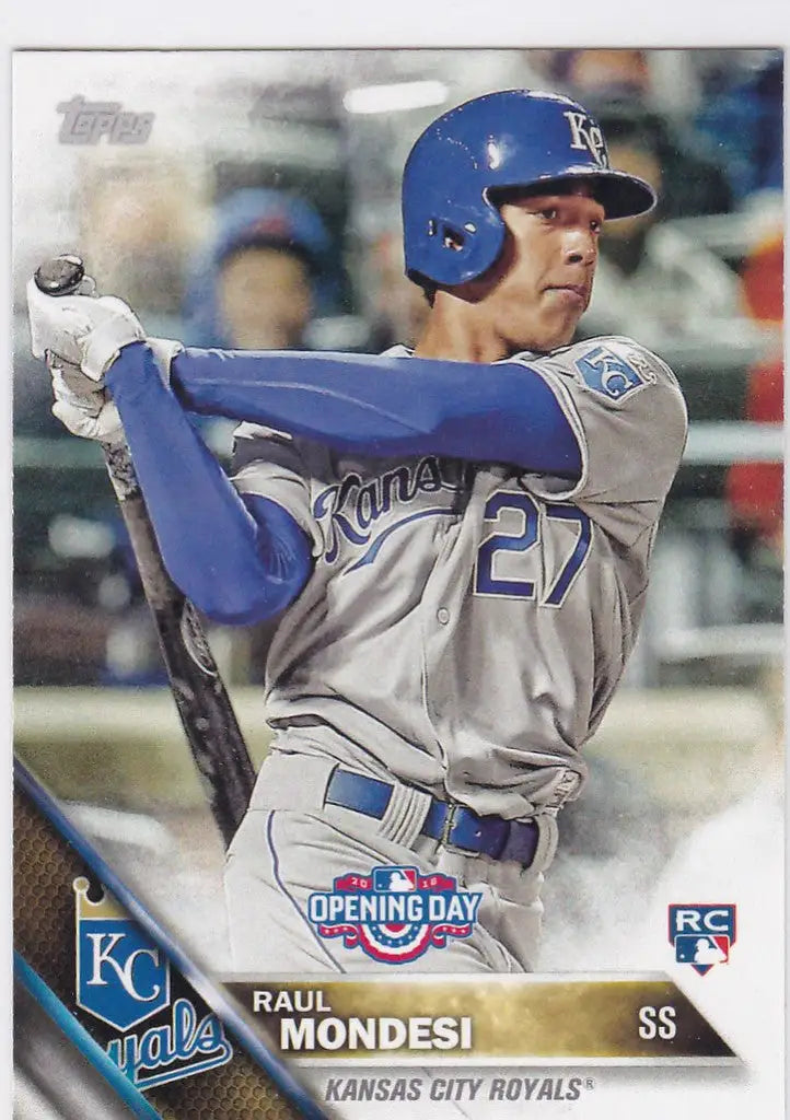Baseball player in blue Kansas City Royals uniform swinging bat on trading card