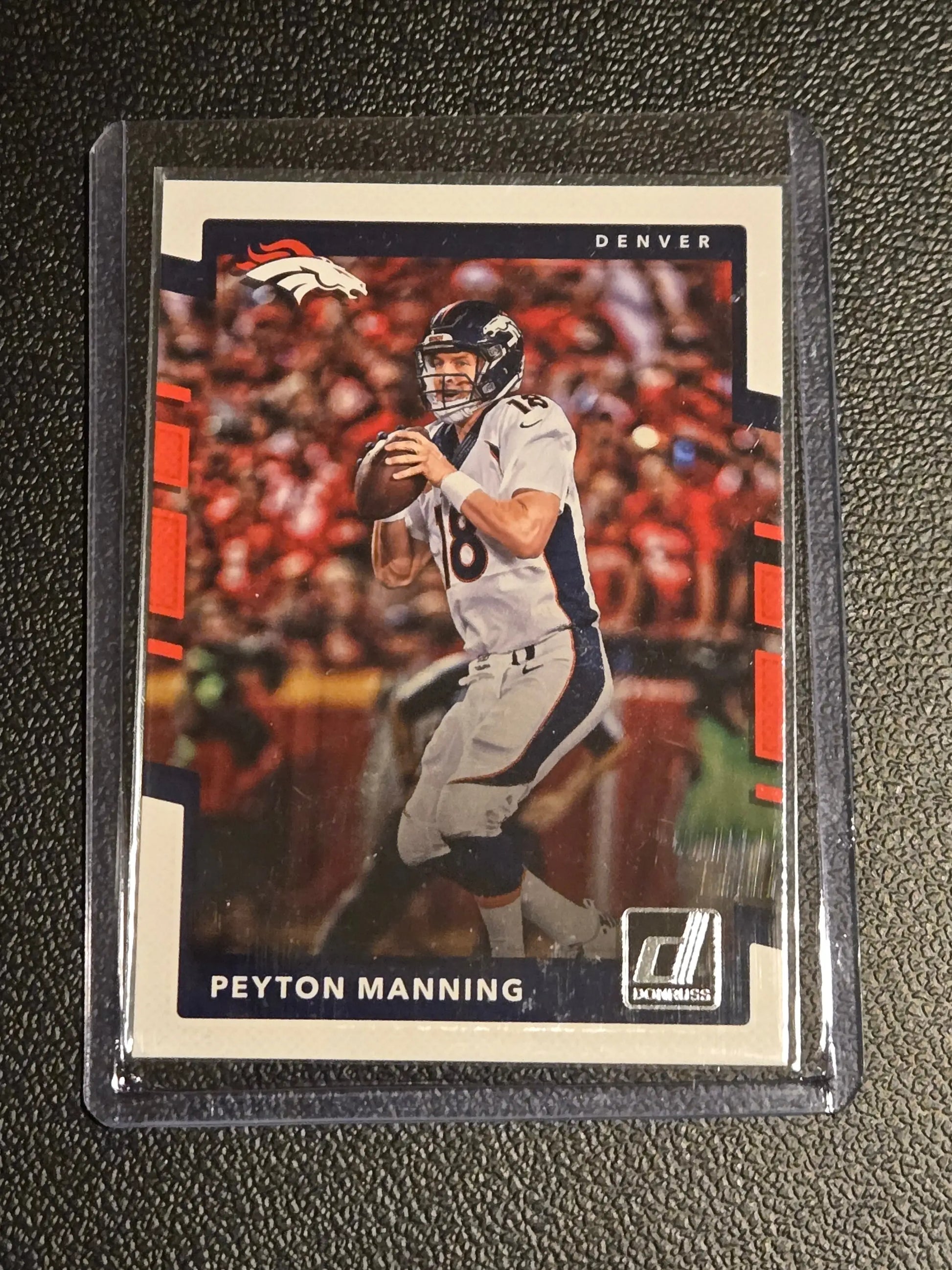 Peyton Manning Denver Broncos football card from 2017 Donruss series