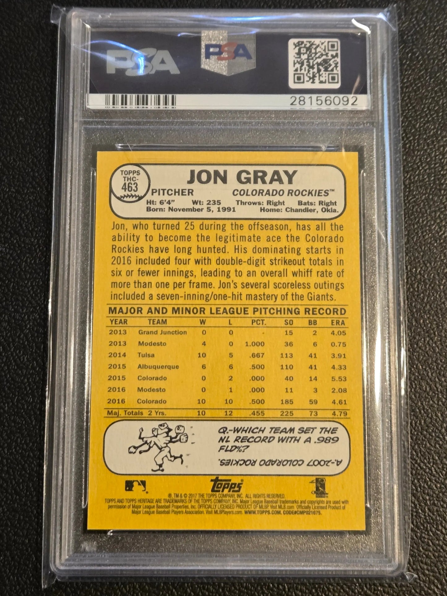 Baseball card of Jon Gray Chrome Purple Refractor PSA 9 in protective case