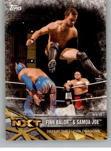 Topps NXT trading card featuring Finn Balor Samoa Joe and a masked wrestler in the ring