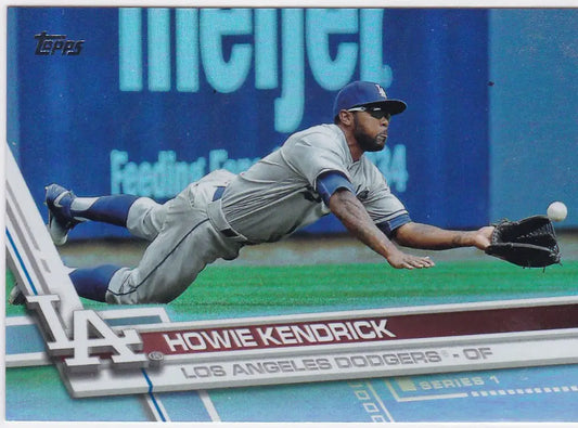 Baseball player Howie Kendrick diving to catch a ball in Topps Rainbow Foil uniform