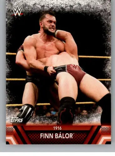 Wrestling trading card featuring Finn Bálor in a hold from 2017 Topps Forever Finishers