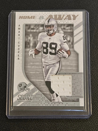 Amari Cooper football trading card with jersey patch from 2018 Score Cooper Home collection