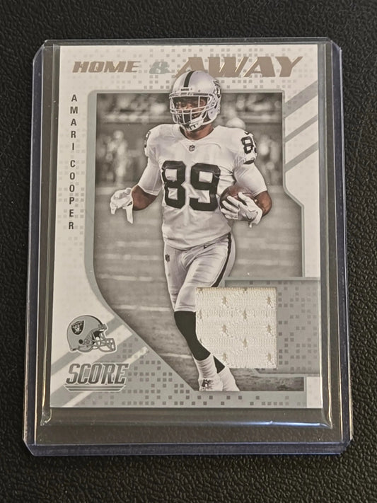 Amari Cooper football trading card with jersey patch from 2018 Score Cooper Home collection